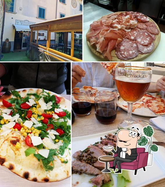Dai un'occhiata agli interni di Ristorante Pizzeria Il Gallo Nero