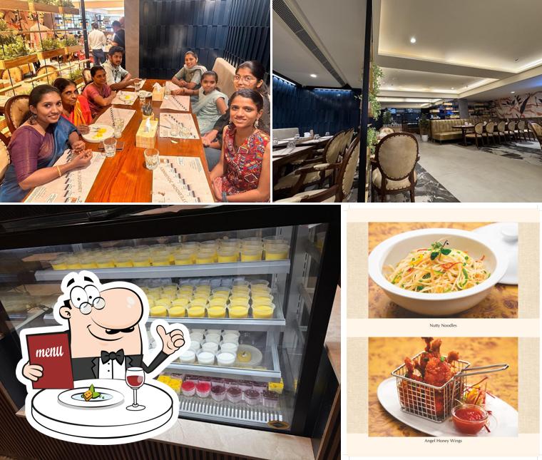 This is the picture showing food and interior at Calicut Notebook Restaurant, Kottayam