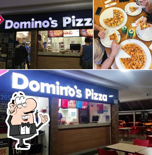 Sente em uma das mesas no Domino's Pizza - Sudoeste