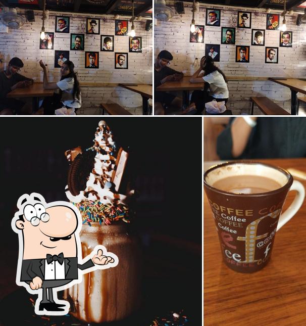 Take a look at the photo showing interior and drink at 9 Tea's cafe
