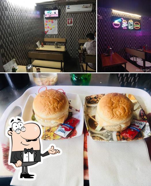 Check out the picture showing interior and food at Bisht Chinese fast food