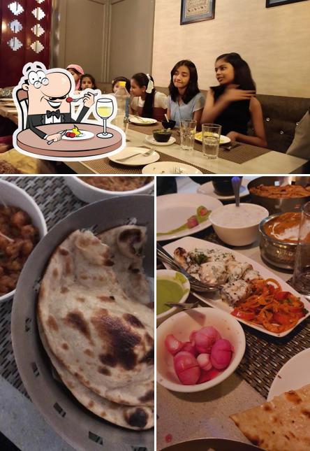 This is the picture showing food and interior at Moti Mahal Delux Restaurant