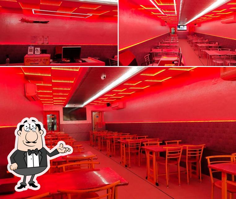 Take a seat at one of the tables at Bhagat Ji Fast Food
