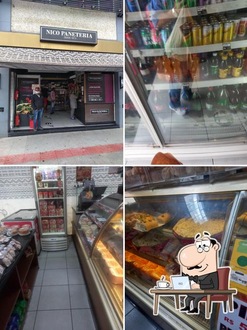 Sente em uma das mesas no Nico Paneteria Centro