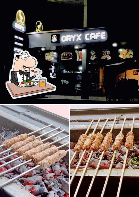 This is the picture showing food and exterior at ORYX CAFE & GRILL
