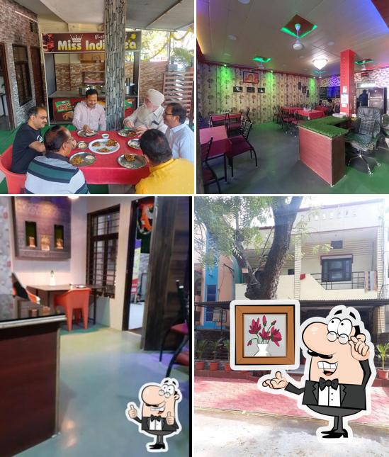 Take a seat at one of the tables at Yash Paratha House
