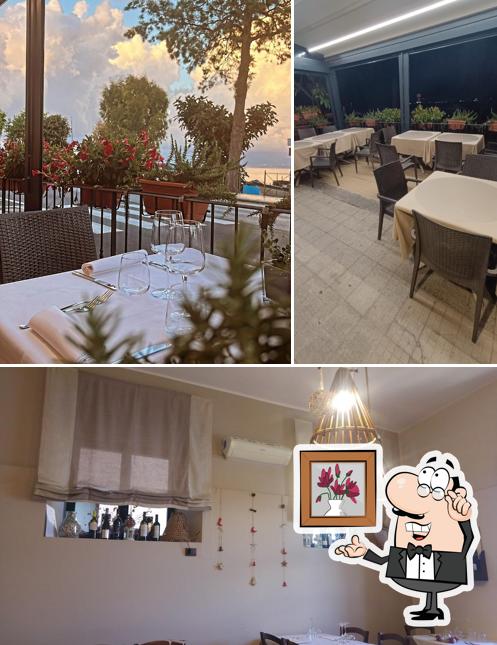 La immagine della interni e tavolo da pranzo di Trattoria da Filippo