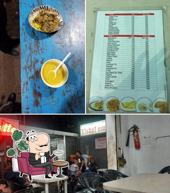 Take a seat at one of the tables at Vishal Omelette Center