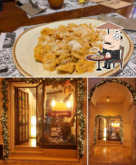 Questa è la foto che mostra la esterno e bevanda di Ristorante Pizzeria la Grotta Fossombrone