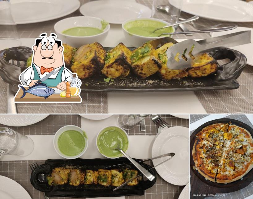Grilled salmon at Hotel Maa Anjani Grand Inn