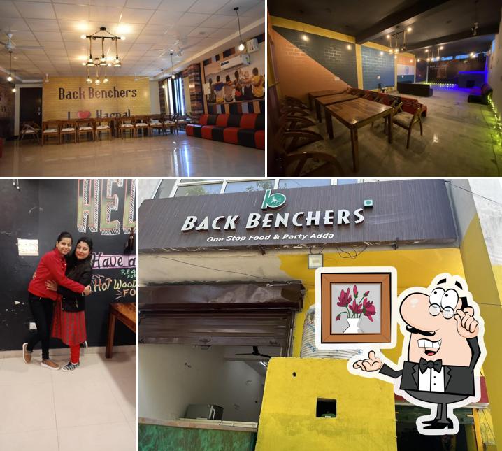 Take a seat at one of the tables at Backbenchers