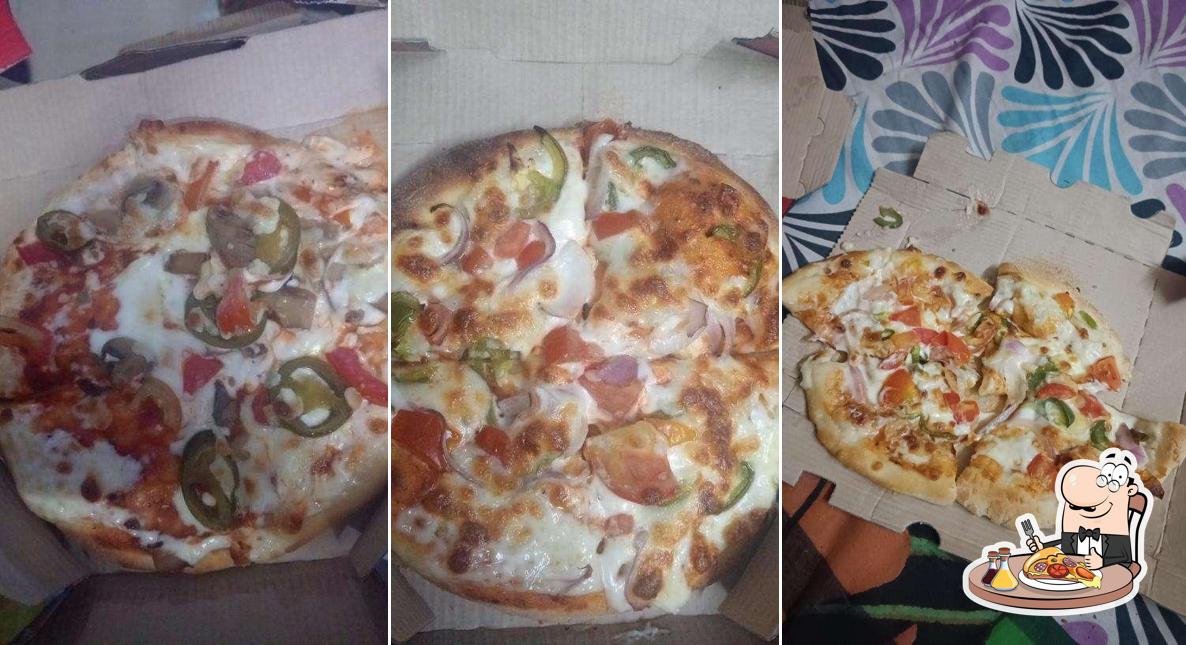 Try out pizza at Pizza Tree