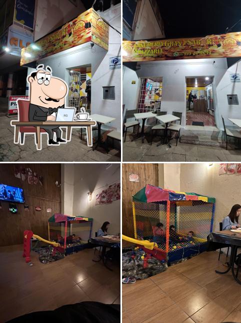 O interior do Pizzaria Grand Sabor