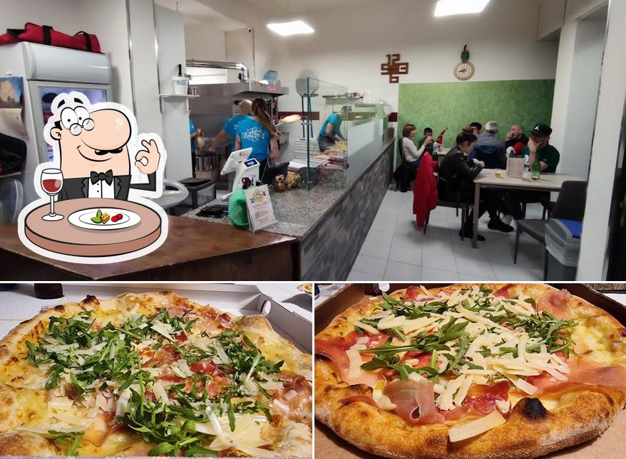 Questa è la immagine che raffigura la cibo e interni di It's Pizza Time