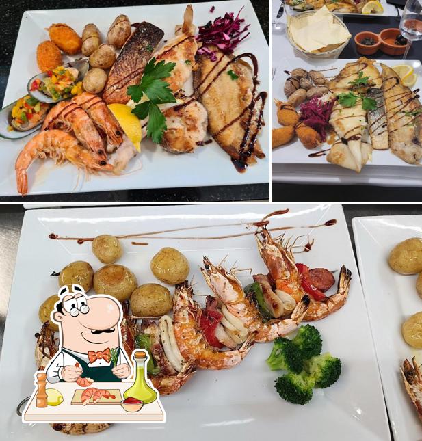 Ordina la cucina di mare a Restaurant Grillhaus