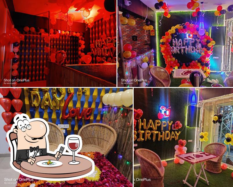 Check out the photo depicting food and interior at Food Junction