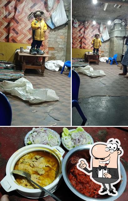 This is the image showing interior and food at Delhi Mughlai Food