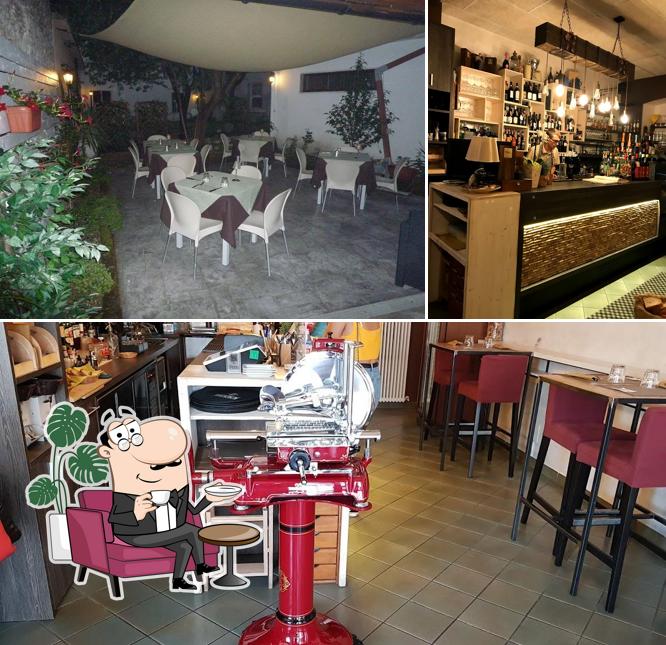 Siediti a un tavolo di Osteria Il Cortile