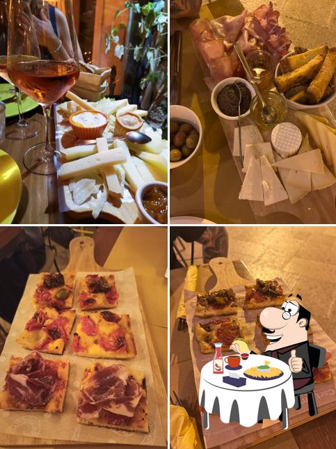 Piatto di formaggi al In alto vineria