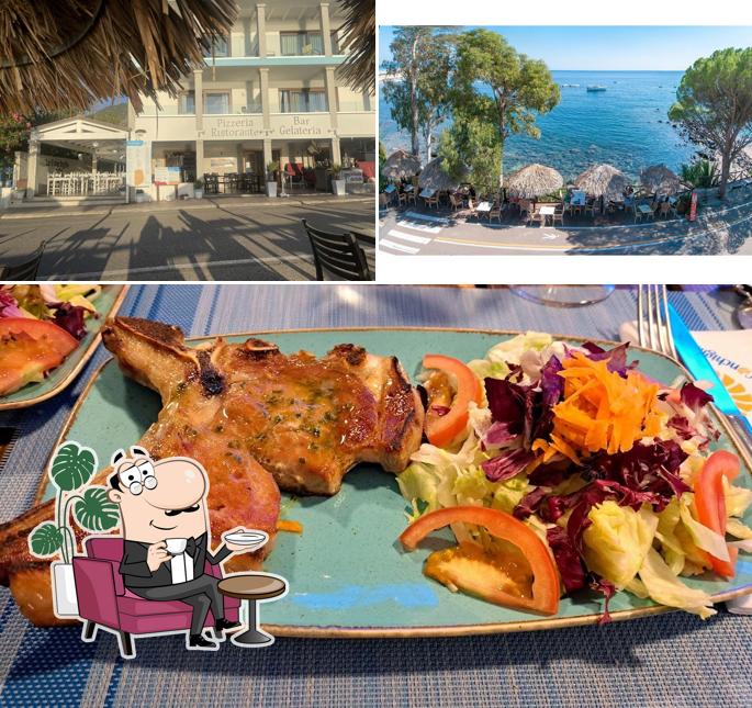 La immagine della interni e cibo di Hotel Ristorante La Conchiglia