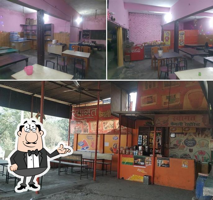 Take a seat at one of the tables at Swagat Family Restaurant