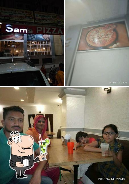 Enjoy a beverage at Sam's PIZZA