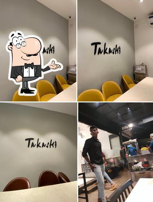 Take a seat at one of the tables at Tamaki
