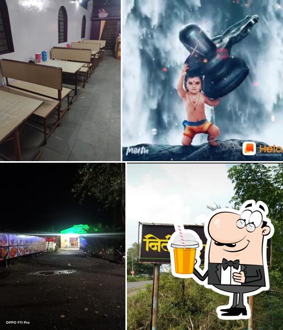 Enjoy a beverage at NITIRAJ MALVANI DHABA
