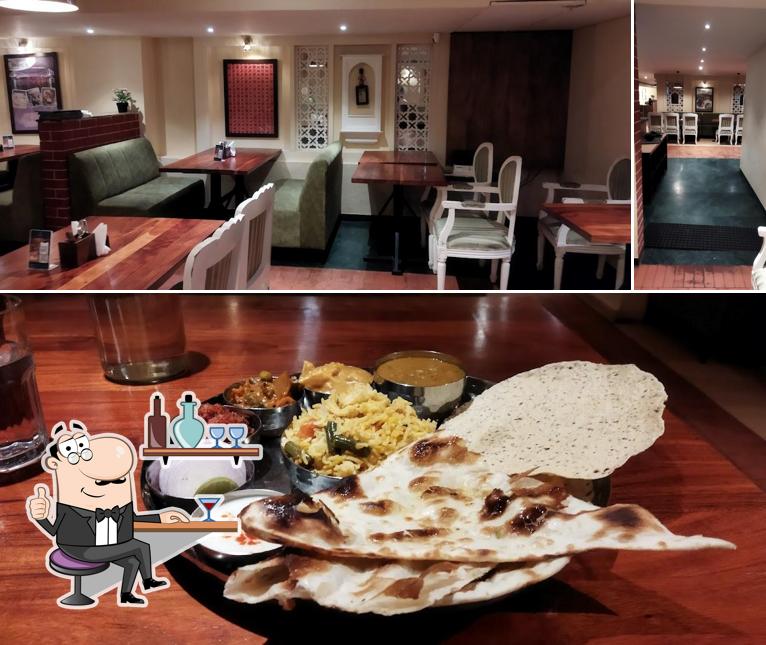 Take a seat at one of the tables at Namchi - Pure Veg Restaurant (Banjara Hills)