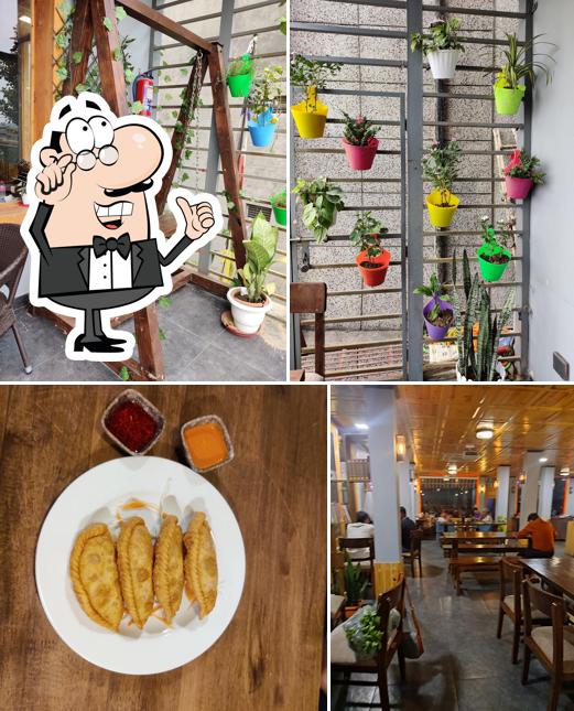 Take a seat at one of the tables at TM kitchen