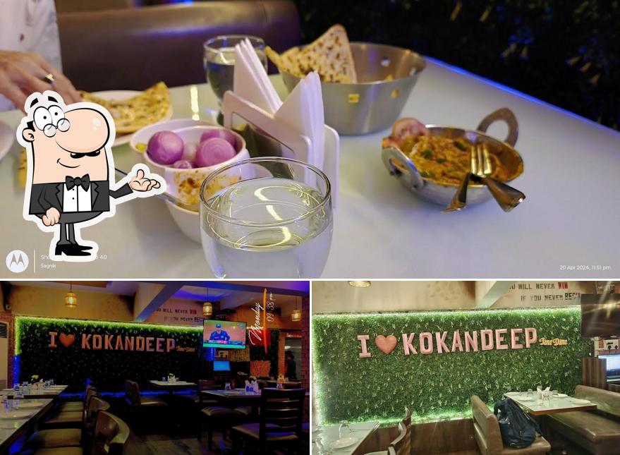 Take a seat at one of the tables at Kokandeep FINE DINE