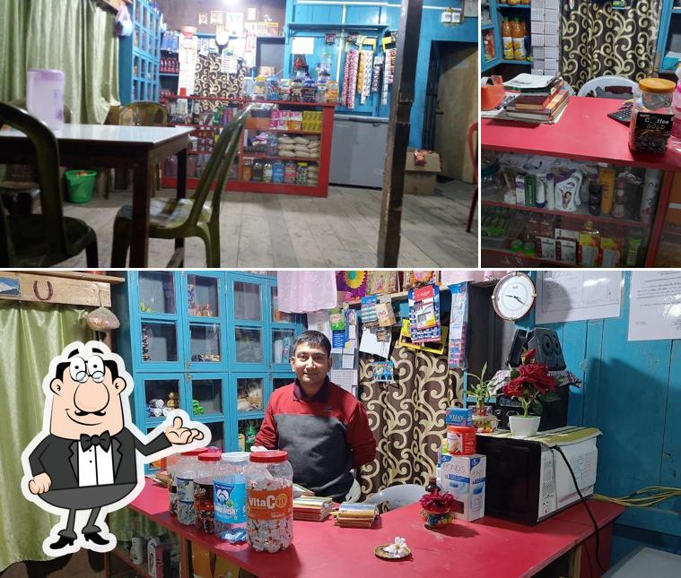 Check out the photo displaying interior and beverage at Kasturi Bengali restaurant