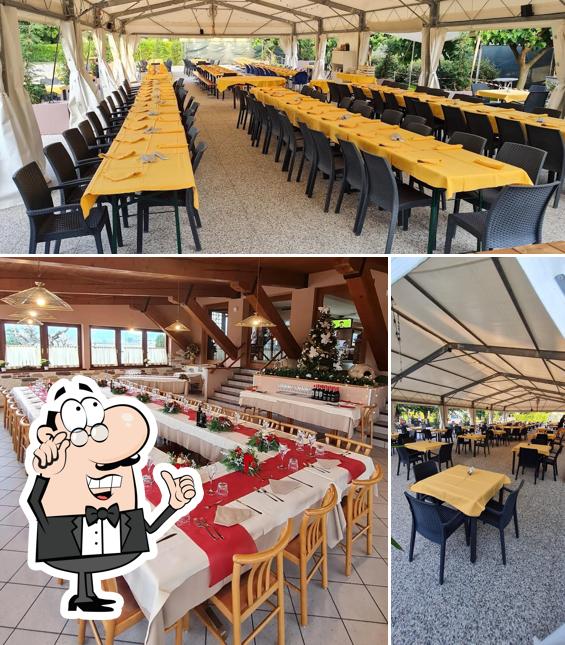 Siediti a un tavolo di Ristorante pizzeria Jolly