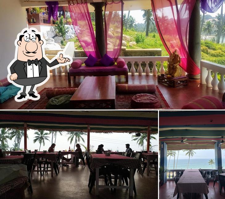 Take a seat at one of the tables at Curry Leaf Restaurant