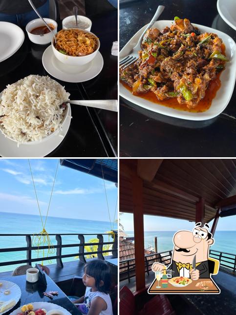 Among various things one can find food and interior at Ocean Grill Restaurant