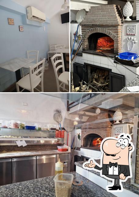 Dai un'occhiata agli interni di Pizza Regina