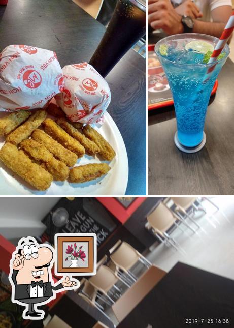 This is the image depicting interior and beverage at meat and eat