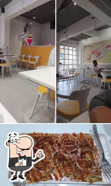 The photo of interior and food at Khandoli Nitin's Canteen (Karad)