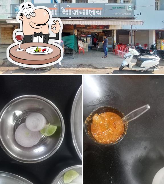 This is the image displaying food and exterior at Sharma Bhojnalaya