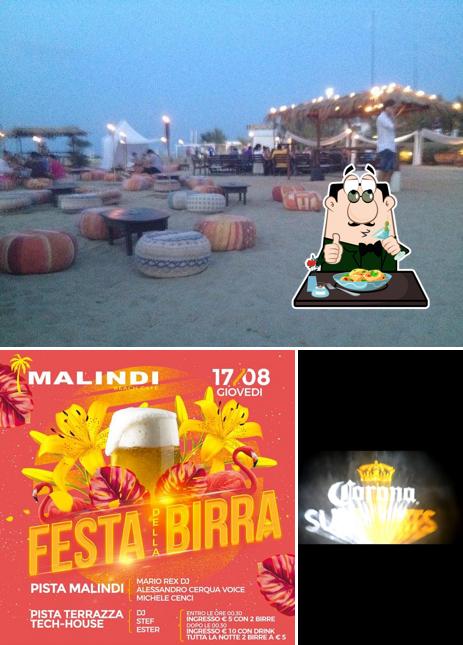 Guarda la foto che presenta la cibo e interni di Malindi ristorante