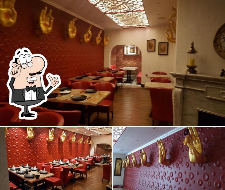 Take a seat at one of the tables at The Park (Hotel & Restaurant)