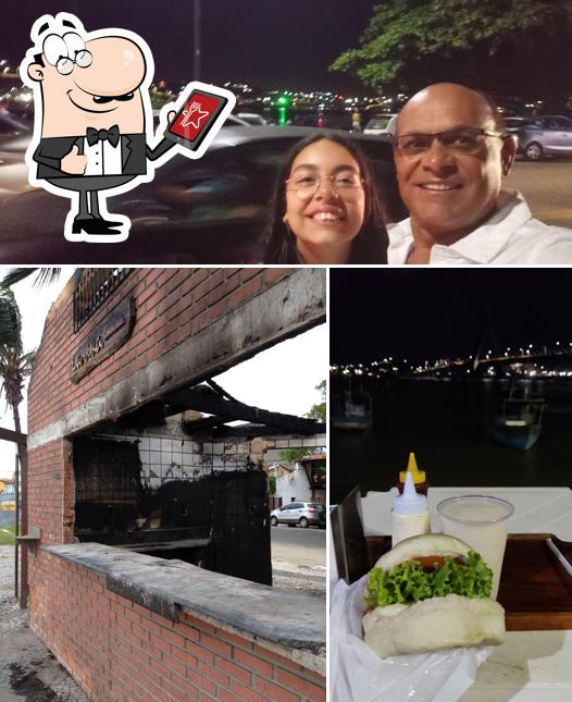 Entre diversos coisas, exterior e comida podem ser encontrados no Larikas lanchonete