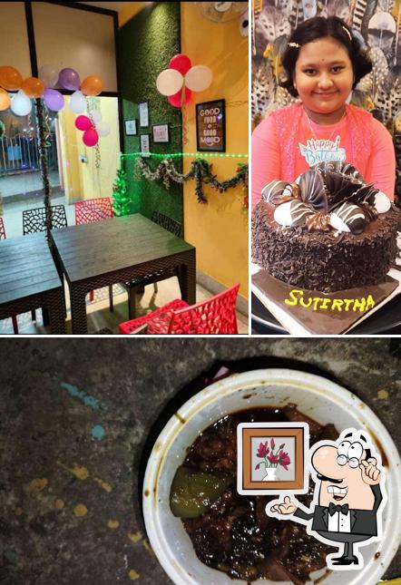 Among various things one can find interior and food at Down to Earth Cafe & Diner