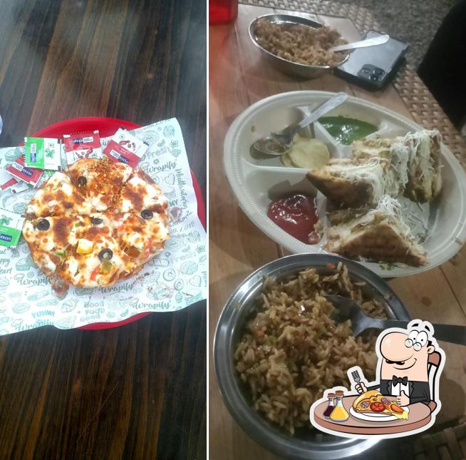 Pick pizza at SHARAMA CAFE & NASTA POINTE