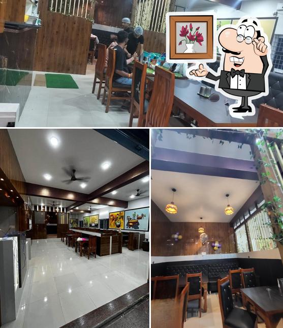 Take a seat at one of the tables at RRR GUNTUR SPICES