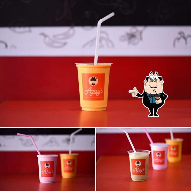 Enjoy a beverage at Ajay's