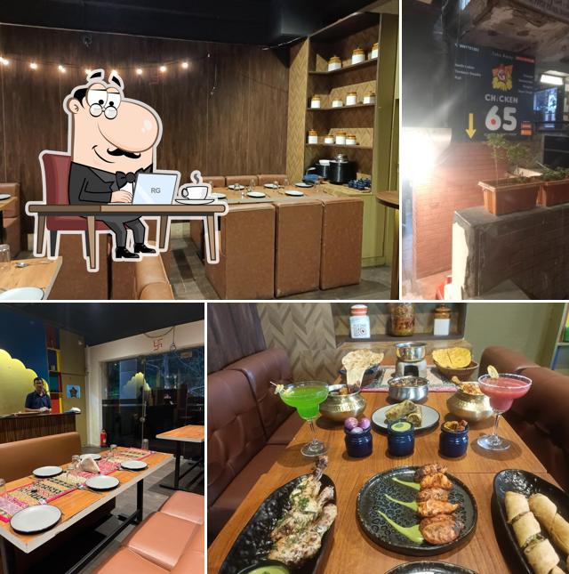 Take a seat at one of the tables at Chicken 65 takeaway and restaurant