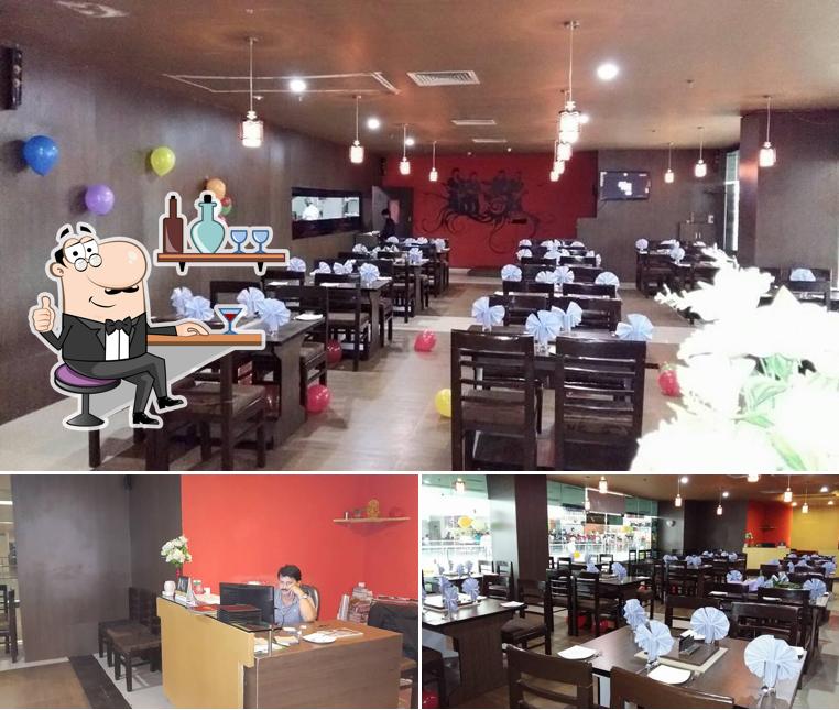 Take a seat at one of the tables at Darbar Kitchen