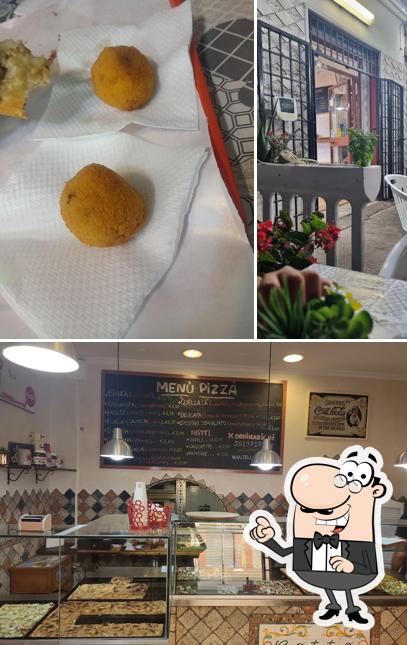 Questa è la immagine che mostra la interni e cibo di ANTIVM PIZZA - Qualità Italiana