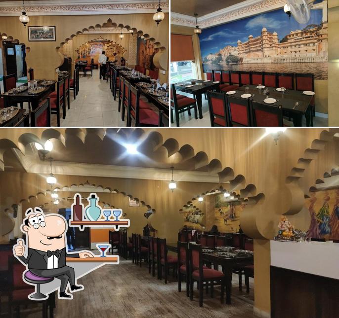 Take a seat at one of the tables at Rajwadi Thal & Restro